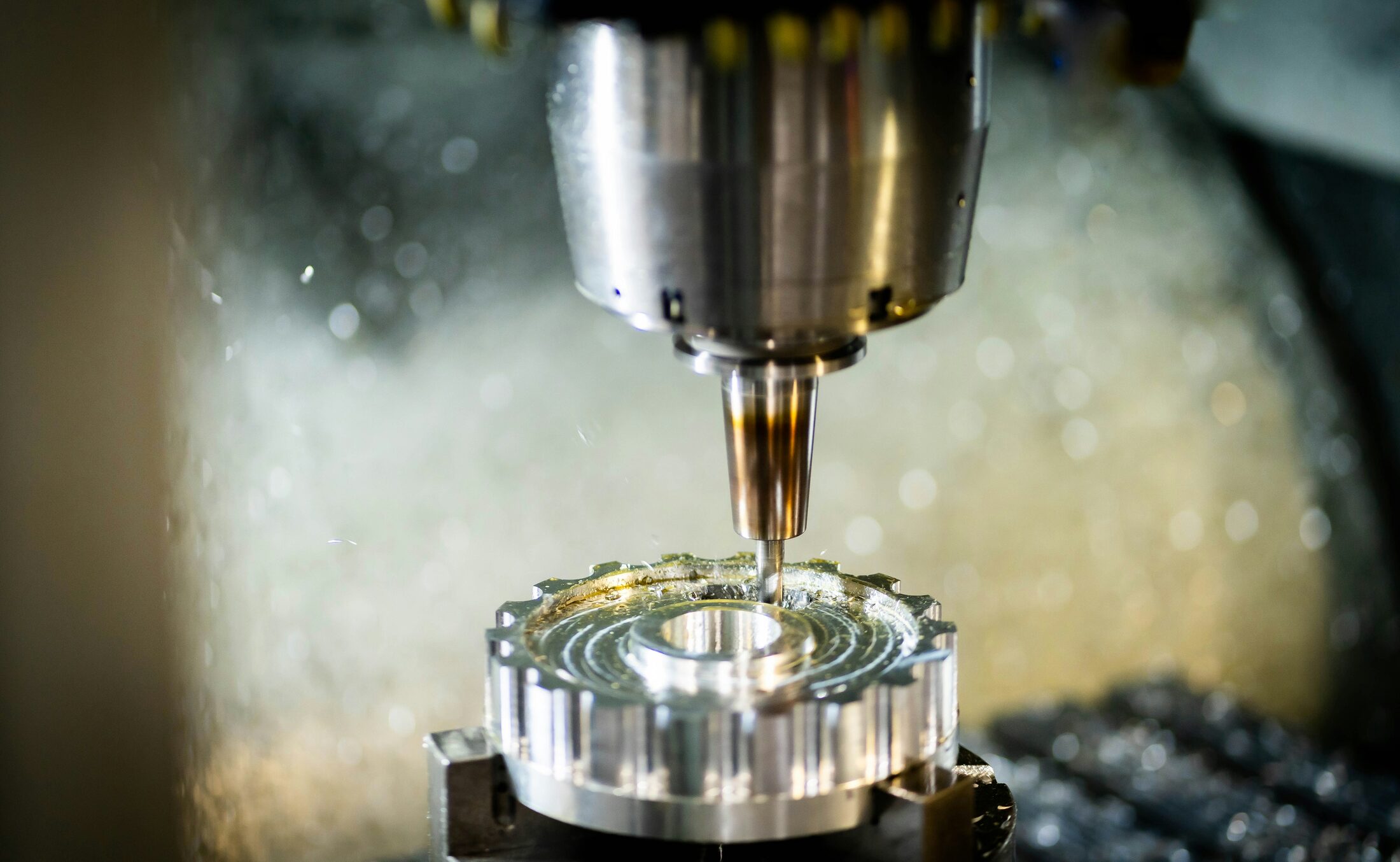 Close, precise work on a piece of machined equipment, examined at a level of detail beyond the obvious